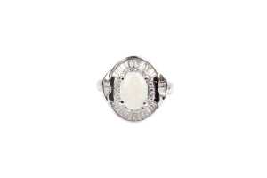 An opal and diamond ring in platinum
