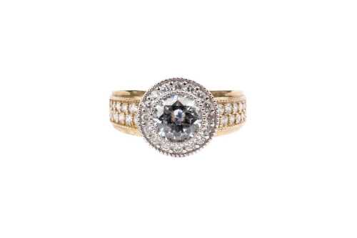 A cubic zirconia ring in 9 carat yellow gold