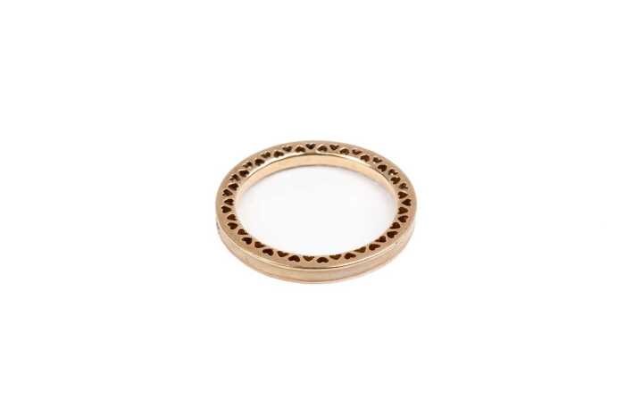 A Pandora cubic zirconia and white enamel ring in 14 carat yellow gold