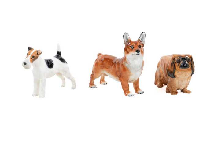 Three Royal Doulton porcelain dog figures