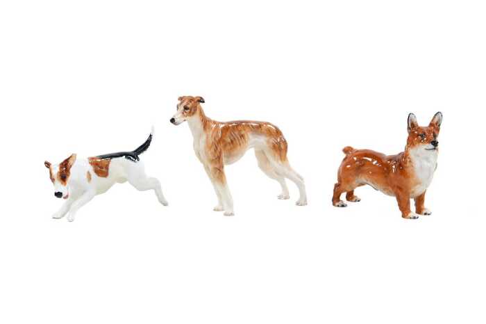 Three Royal Doulton porcelain dog figures