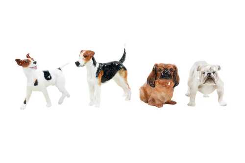Four Royal Doulton porcelain dog figures