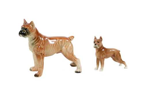 Two vintage porcelain Boxer dog figures