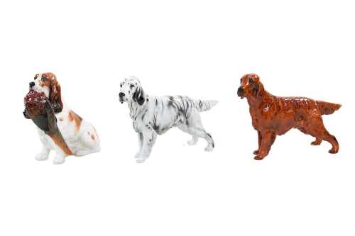 Three Royal Doulton Spaniel dog figures