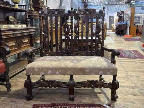 Jacobean style walnut two seat settee