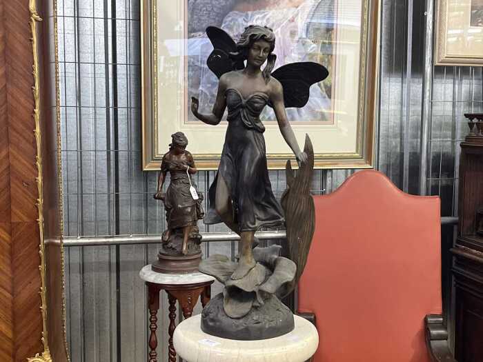 Art Nouveau cast bronze sculpture of a fairy standing on a flower