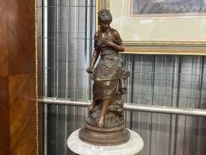 After Auguste Moreau, antique cast spelter figure of a lady