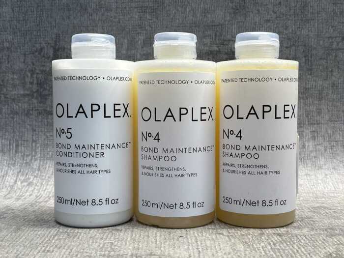 Three bottles of Olaplex shampoo & conditioner