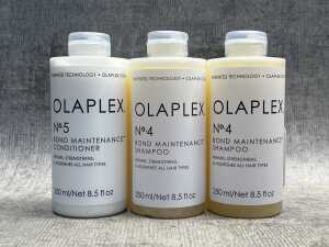 Three bottles of Olaplex shampoo & conditioner