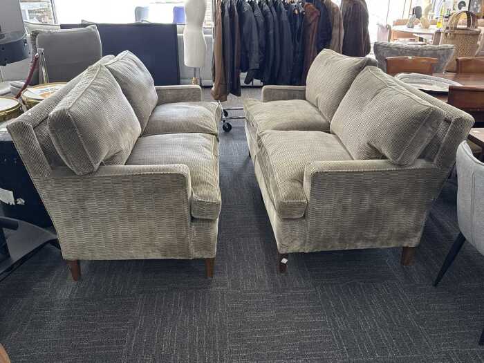 Pair of upholstered two-and-a-half-seat sofas