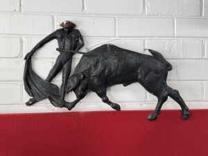 Mid-century Matador and bull pressed metal wall sculpture