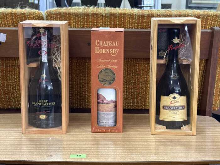 Three bottles of port in presentation boxes