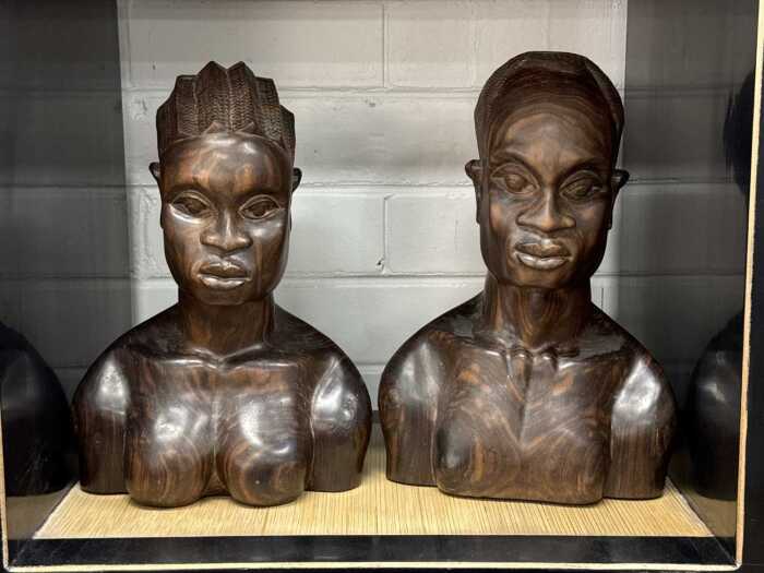 Hand-carved timber busts of African figures