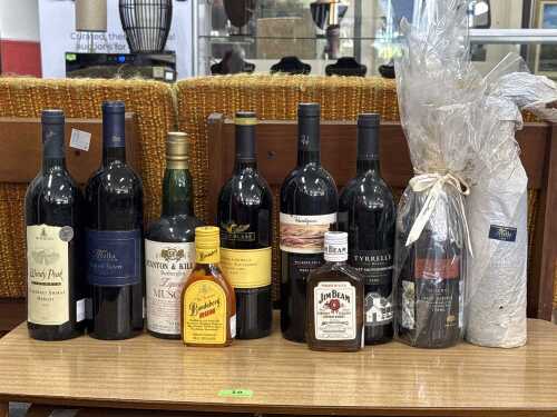 Ten assorted bottles of alcohol