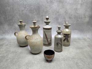 Studio pottery cruet sets, together with drip glaze tea bowl