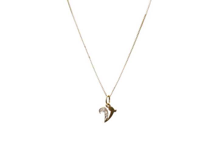 A diamond V initial pendant and necklace in 9 carat yellow gold