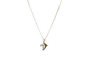 A diamond V initial pendant and necklace in 9 carat yellow gold
