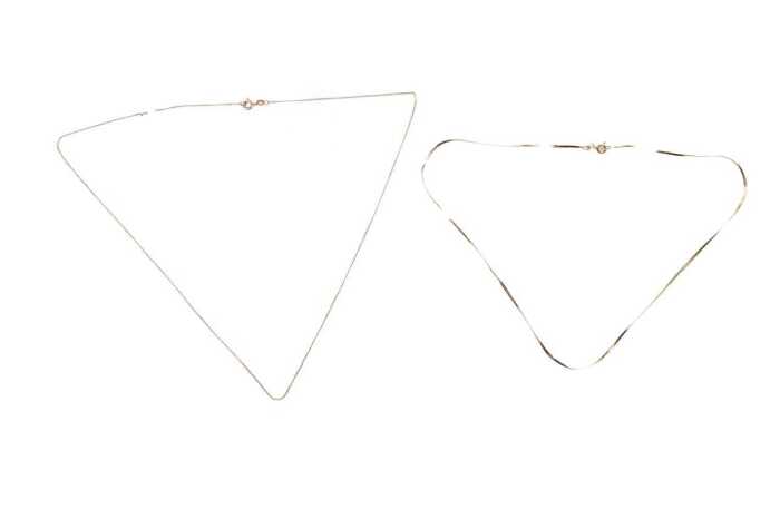 Two broken chains in 9 carat yellow gold