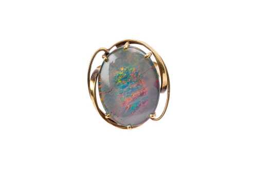 A vintage opal triplet ring in 9 carat yellow gold