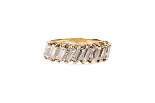 A cubic zirconia ring in 9 carat yellow gold