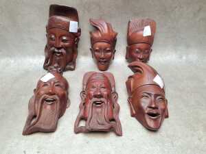 Asian carved timber wall masks and elephant bookends - 3