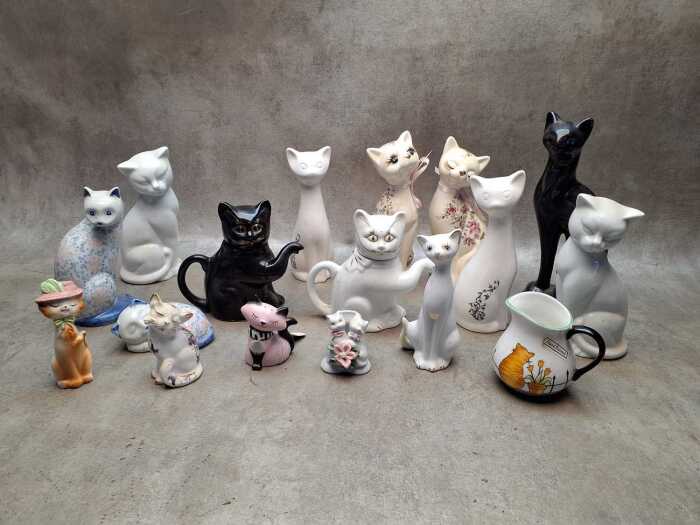 Group of mostly ceramic cat figures
