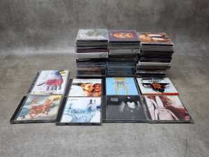 CDs, mostly '90s and '00s music, including Red Hot Chili Peppers, Radiohead, Stone Roses