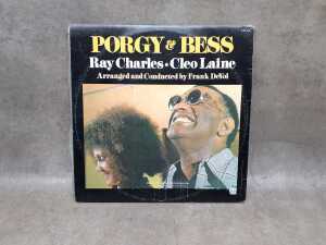 Three vinyl records, including Muddy Waters "Hoochie Coochie Man" - 3