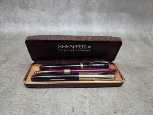 Three vintage fountain pens, including Parker Vacumatic