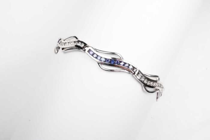 A tanzanite and cubic zirconia bracelet in sterling silver