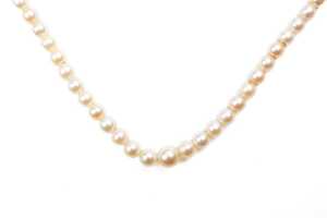 A strand of graduated white cultured pearls to a German 835 silver marcasite clasp. - 2