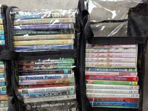 DVDs in PVC storage bags, mostly British TV shows - 5