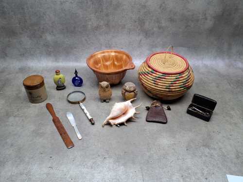 Assorted items, including a snuffbox, a terracotta sunflower cake mould