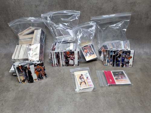 Vintage NBA basketball trading cards, including NBA Hoops
