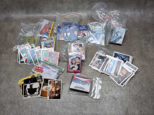 Group of collectible trading cards, including Batman Returns