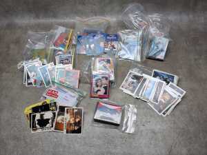 Group of collectible trading cards, including Batman Returns
