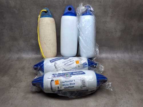Five Majoni Starfender boat fenders in blue and white.
