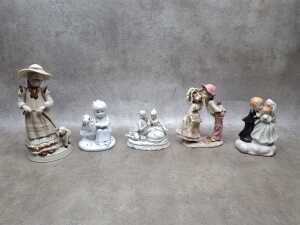 Assorted porcelain figures including cherubs, courting couples, bisque, etc - 4