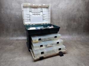 Green hardcase tackle box with tools and fishing accessories