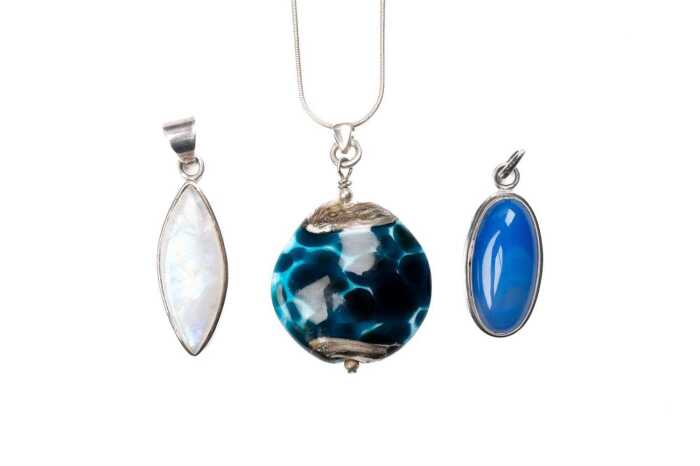 Collection of three pendants in sterling silver