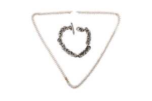 A bracelet and necklace in sterling silver