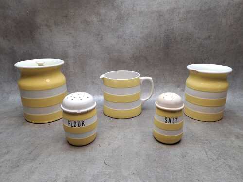 Five yellow and white ceramic Cornish Kitchenware, A/F