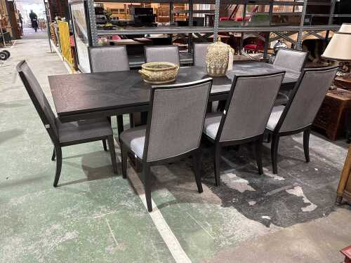 Contemporary black timber nine-piece dining suite
