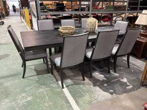 Contemporary black timber nine-piece dining suite