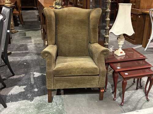 Olive corduroy upholstered wingback armchair