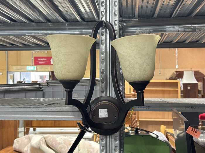 Traditional style two-light wall sconce
