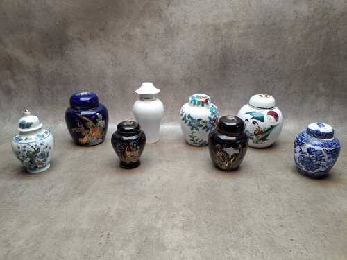 Seven Oriental ginger jars including hand-painted, applied gilt, etc.