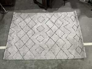 Cream and grey geometric floor rug