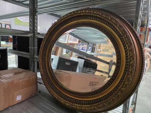 Vintage gilt oval wall mirror with delicate leaf detail