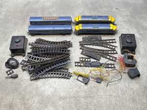 Tri-ang OO scale model trains in blue and yellow livery